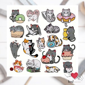 May include: A collection of embroidered patches featuring various cat designs. The patches showcase cats with donuts, hearts, cupcakes, and yarn. The color palette includes gray, orange, white, and black, with detailed stitching.