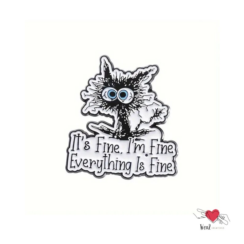 May include: A black and white enamel pin featuring a distressed cat with wide blue eyes. The pin has the text "It's Fine. I'm Fine. Everything Is Fine" in a stylized font, perfect for adding a touch of humor to any outfit.