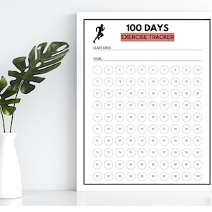 May include: A white framed 100 Days Exercise Tracker print featuring a black silhouette of a running person, the text 100 DAYS EXERCISE TRACKER, a line for start date, a line for goal, and a grid of one hundred numbered circles for tracking.