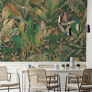 May include: Dark green wallpaper featuring a lush tropical jungle design with large leaves and flowers in shades of green, gold, and orange. The wallpaper creates a vibrant and exotic atmosphere, perfect for adding a touch of nature to any room.