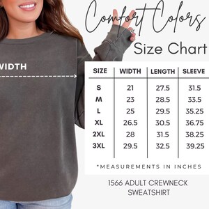 May include: Size chart for a Comfort Colors adult crewneck sweatshirt. The chart shows measurements in inches for width, length, and sleeve length for sizes S, M, L, XL, 2XL, and 3XL.