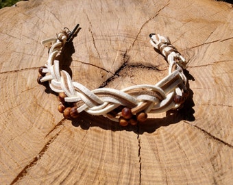 Braided suede leather bracelet with wrapped sinew and 24 olive wood beads