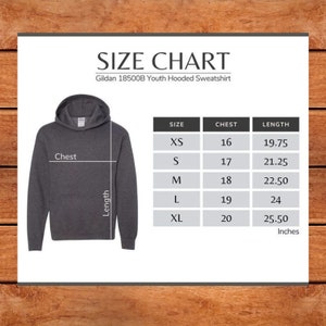 May include: Size chart for a Gildan 18500B Youth Hooded Sweatshirt. The chart shows sizes XS through XL with corresponding chest and length measurements in inches.