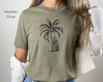 Cool Surfboard Against a Palm Tree Unisex T-Shirt, Summer Tropical Vacation Shirt, Cute SurfingTee, Gift for Surfer Girl, Beach Lover Shirt