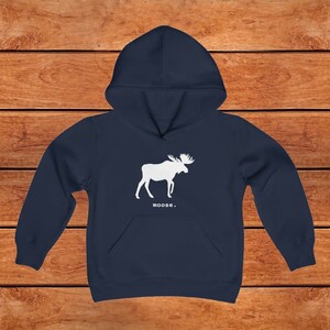 This youth hoodie features a white graphic of a moose with antlers facing to the right. The word moose is in lower case white font below the graphic, followed by a period.