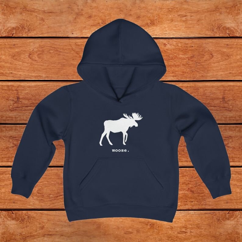 This youth hoodie features a white graphic of a moose with antlers facing to the right. The word moose is in lower case white font below the graphic, followed by a period.