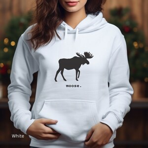 Adult unisex hooded sweatshirt with a graphic of a moose profile above the word moose in lower case font, followed by a period. Shown in White.