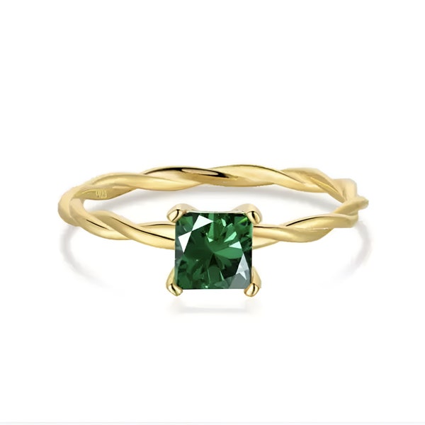 Twisted Diamond Ring mit smaragt grünem oder weißem Stein in gold. Spiralring besetzt mit funkelndem Stein in gold. Ring für Damen.