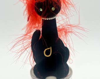 Porta perfumes Max Factor Sophisti-Cat con forma de gato negro y tubo, figura vintage de tocador de mediados de siglo.