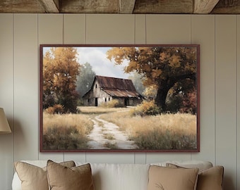 May include: A framed landscape painting depicts a rustic barn with a weathered metal roof, set amidst a field of tall, golden grass. The artwork features a dirt path leading to the barn, surrounded by trees with autumn-colored foliage.
