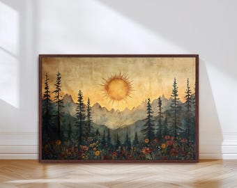 May include: A framed landscape painting depicts a sunset over a mountain range. Silhouetted evergreen trees and colorful wildflowers are in the foreground. The sun is a bright orange circle in a golden sky. The frame is dark brown.