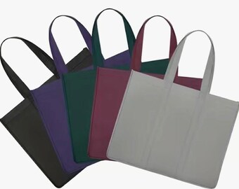 May include: Five reusable shopping bags in different colors: black, purple, green, burgundy, and gray. The bags have two handles and are made of a sturdy fabric.