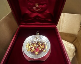 The Steuben 18k gold and glass apple of Eden