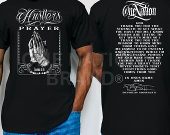 May include: Black t-shirt with a white graphic of a praying hand and the text "Hustler's Prayer" and "James 5:15". The back of the shirt has the text "OneNation" and a prayer.