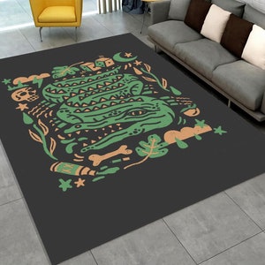 Alfombra con diseño de cocodrilo, ilustración de reptil, criatura oscura y juguetona, decoración única para habitación infantil, alfombra con un peculiar estilo animal.