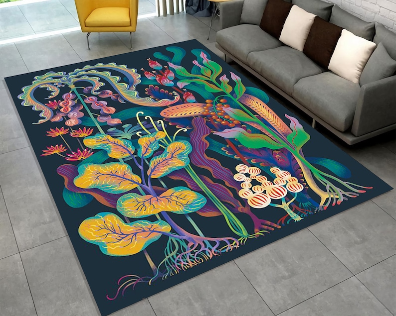 May include: A colorful rug with a floral design featuring vibrant green, yellow, purple, and red hues. The rug has a dark blue background and intricate details.
