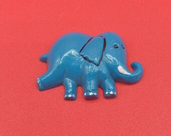 Vintage blue plastic elephant magnet