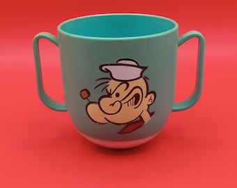 Vintage 1970s Popeye blue plastic sippy cup with weighted wobble bottom double handles