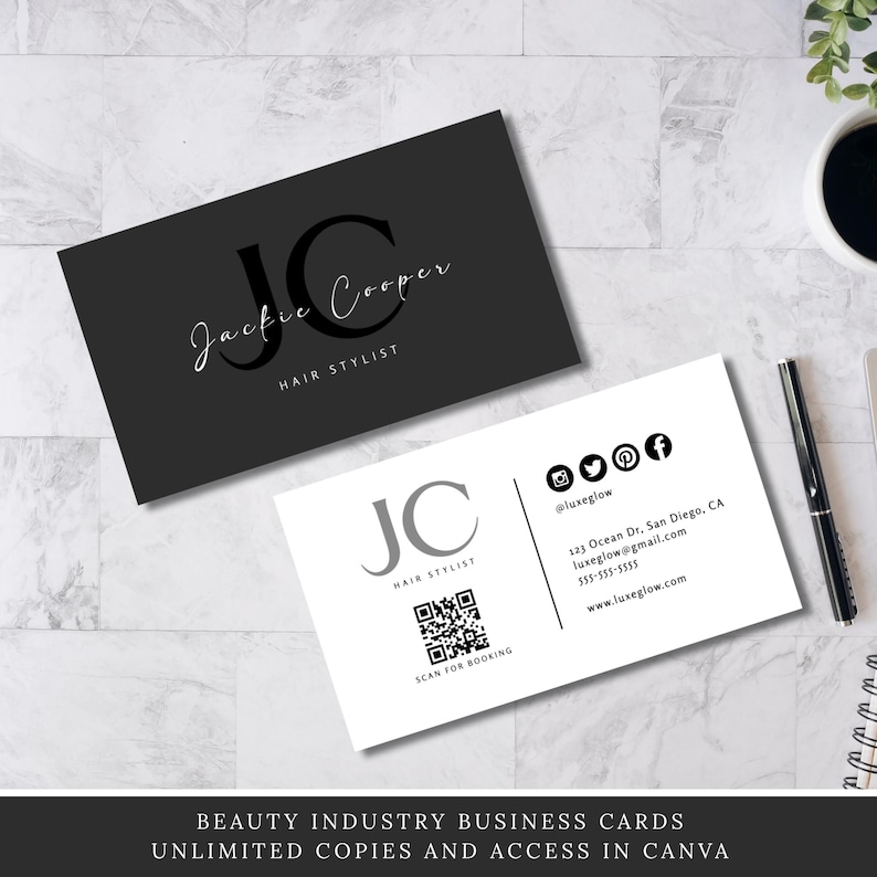 May include: Two business cards for a hair stylist named Jackie Cooper. The first card is black with white text and the second card is white with black text. The text on both cards includes the name Jackie Cooper, the title Hair Stylist, the initials JC, a QR code, and contact information including a website, email address, phone number, and social media handles.