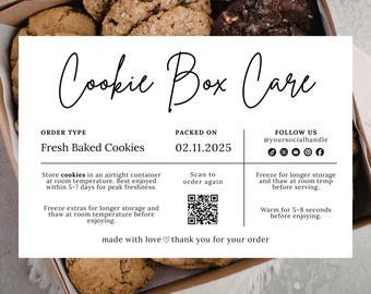 May include: A box of fresh baked cookies, with a care instruction card. The card reads "Cookie Box Care" and includes storage and thawing instructions. The cookies are various types, including chocolate chip and oatmeal raisin.