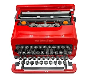 Máquina de escribir Olivetti Querty Red Valentine de 1969, en buen estado de funcionamiento. Leer