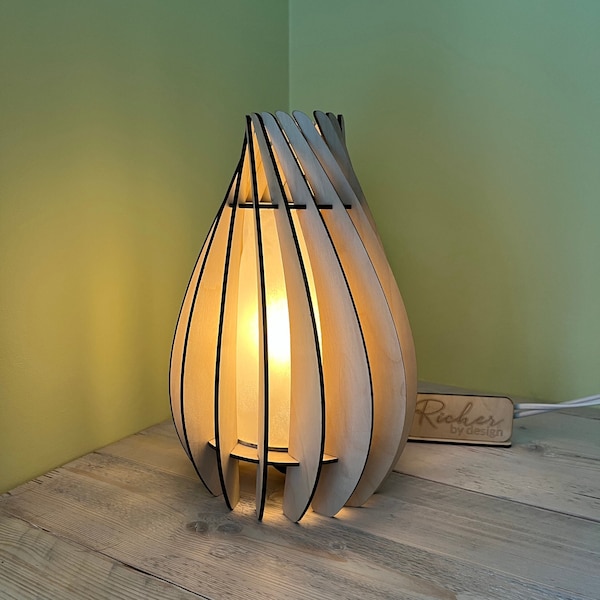 Unique contemporary table lamp available in a choice of colours, UK E27 fitting with switch.