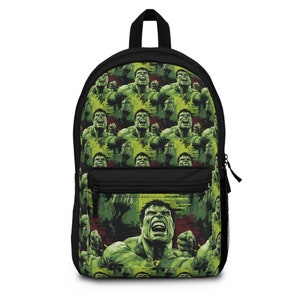 May include: Black backpack with a green and yellow pattern of the Hulk's face.