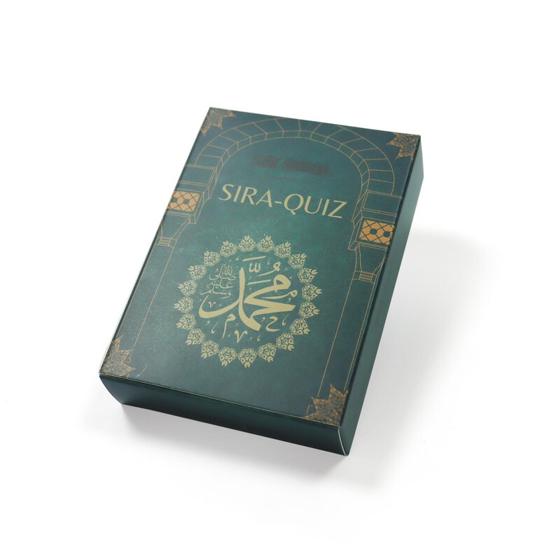 May include: A green box with gold accents and the text "SIRA-QUIZ" on the front. The box features an ornate design with an Arabic inscription in a circle.