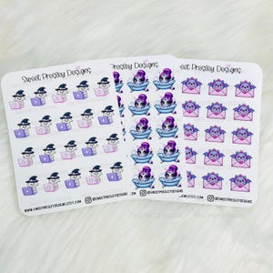 May include: Three sheets of stickers featuring various cute cartoon characters. The first sheet features a witch with a cat on a laptop. The second sheet features a vampire in a bubble bath. The third sheet features a bat holding a letter.