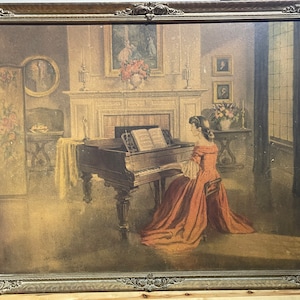lady in red dress playing piano Emotional Piano Performance by Lady in Red Dress