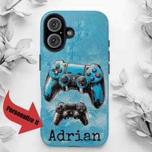 May include: A blue phone case featuring a stylized design of two game controllers. The larger controller is blue and black, with the name "Adrian" printed in white at the bottom. The text "Personalize it" is on a red arrow.