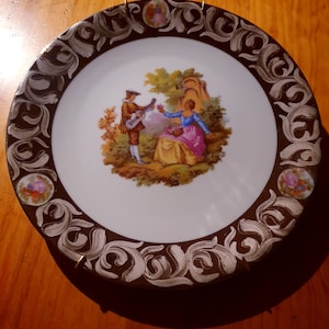 Porcelain plate. Made in France. Hand painted.