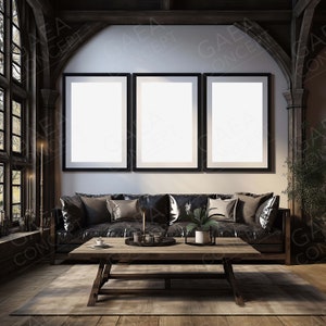 May include: Interior design featuring a black leather sofa, wooden coffee table, and three framed art pieces with white space. The room has a gothic architectural style with large windows and a rug.