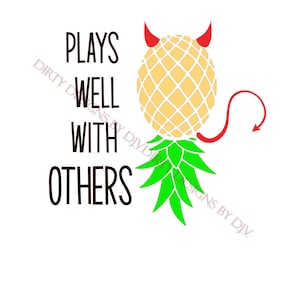 May include: A white graphic with the text "PLAYS WELL WITH OTHERS". The image features a pineapple with red devil horns and a tail, and green leaves. The pineapple is yellow with a grid pattern.