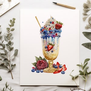 Puede incluir: Una pintura de acuarela de un vaso alto lleno de un batido cubierto con crema batida, fresas y ar&aacute;ndanos. El batido est&aacute; rociado con glaseado azul y tiene un borde dorado. Una sola rosa roja y m&aacute;s ar&aacute;ndanos est&aacute;n esparcidos alrededor del vaso.