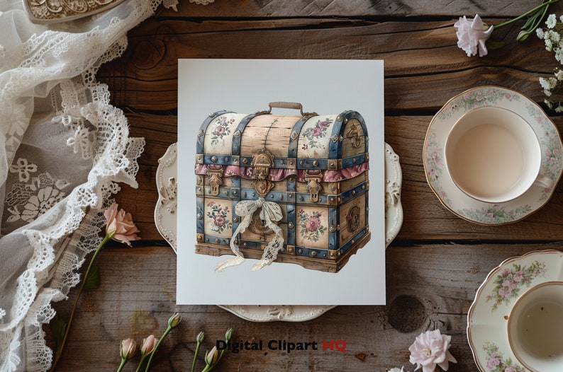 May include: A vintage wooden chest with a blue and white floral design. The chest has a brass lock and hinges, and is decorated with a pink ribbon and lace.