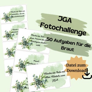 May include: A set of white cards with green watercolor accents and botanical illustrations. Each card features a camera icon and German text. The cards are part of a "JGA Fotochallenge" with 50 tasks for the bride.