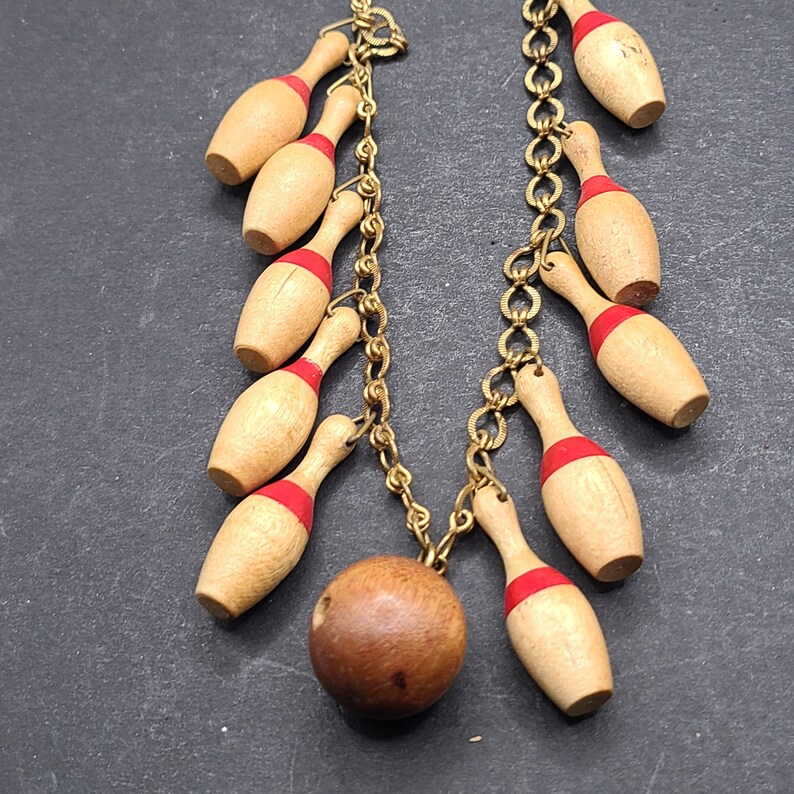 Necklace Bowling Pins and Ball in Wood. Set of 10 Pins . 1940's Gold