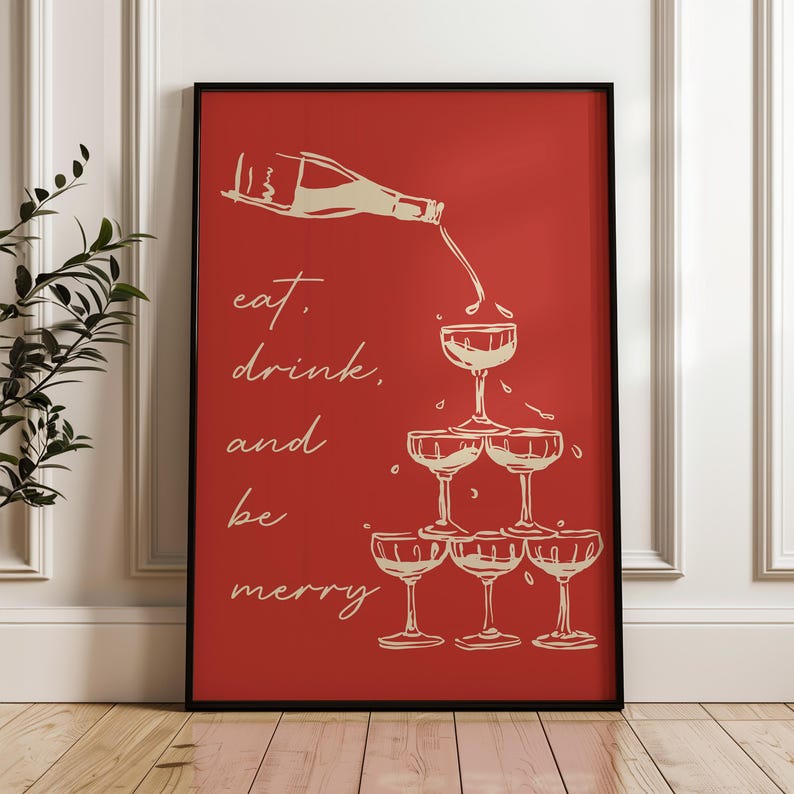 K&ouml;nnte beinhalten: Ein roter Poster mit einer wei&szlig;en Umrandung einer Champagnerflasche, die in einen Stapel Champagnergl&auml;ser gegossen wird. Der Text "eat, drink, and be merry" ist in wei&szlig; auf der linken Seite des Posters geschrieben.