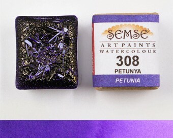 Può includere: Una pastiglia di acquerello di colore viola con un luccichio dorato. La pastiglia è etichettata "Semse Art Paints Watercolour 308 Petunya".