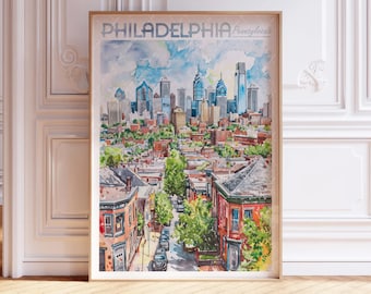 May include: Watercolour print of Philadelphia, Pennsylvania, showing the city skyline and residential buildings. The artwork is framed in a light wood frame and includes the city name in a light blue font.