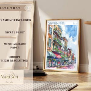 May include: A watercolor painting of a street scene in Savannah, Georgia. The painting features colorful buildings with balconies, green trees, and people walking on the sidewalk. The text "SAVANNAH Georgia" is printed at the top of the painting.
