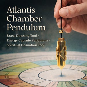 May include: A brass Atlantis Chamber Pendulum, a dowsing tool, hangs over a colorful chart. The pendulum is gold-colored with a pointed tip and is suspended by a black cord. Text on the image reads: "Atlantis Chamber Pendulum".