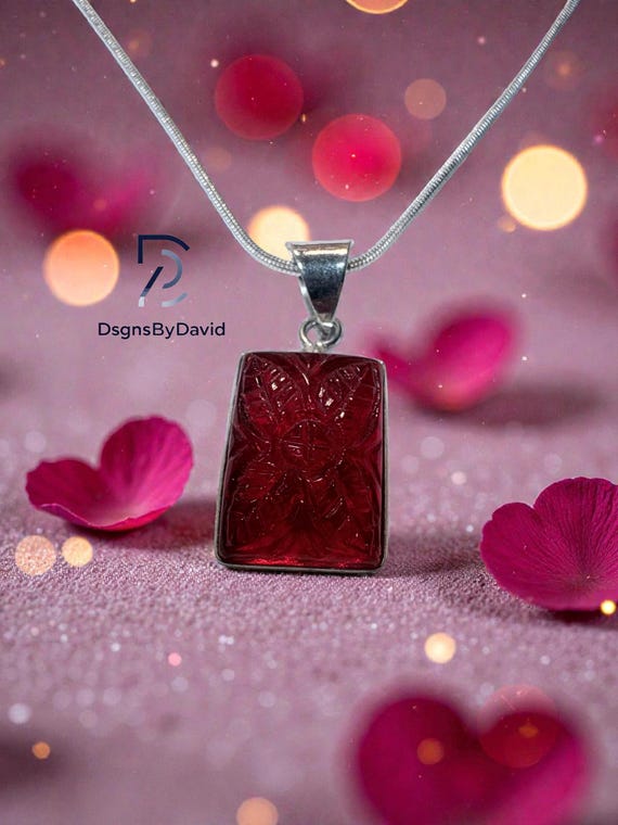 CARVED GARNET JEWELRY