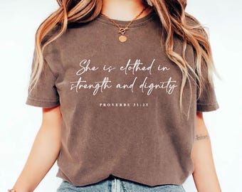 She is Clothed in Strength and Dignity Shirt, Proverbs 31:25 Christian Tee, Faith Inspirational Gift for Women, Bible Verse Apparel