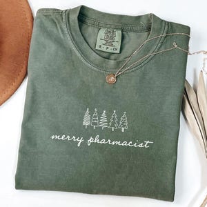 Merry Pharmacist Christmas T-Shirt: Festive Pharmacy Staff Tee