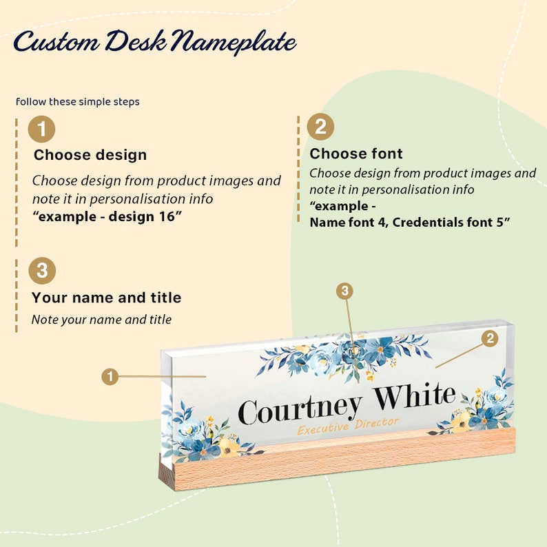 May include: A custom desk nameplate with a clear acrylic front and a wooden base. The nameplate features a floral design in shades of blue and yellow. The name "Courtney White" and title "Executive Director" are displayed in elegant fonts.