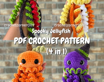 May include: Four plush crochet jellyfish toys featuring a Frankenstein monster, a candy corn, a pumpkin, and a witch design. The text reads crochetcorner0114 Spooky Jellyfish PDF CROCHET PATTERN (4 in 1). Each jellyfish has curly tentacles and black eyes.