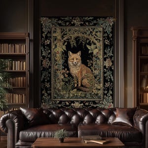 May include: A rectangular wall tapestry featuring a central illustration of a fox surrounded by lush green foliage and flowers, framed by a dark ornate border. The text "INK & SHADOW Fine Art Home Decor" is printed in white on the lower section.