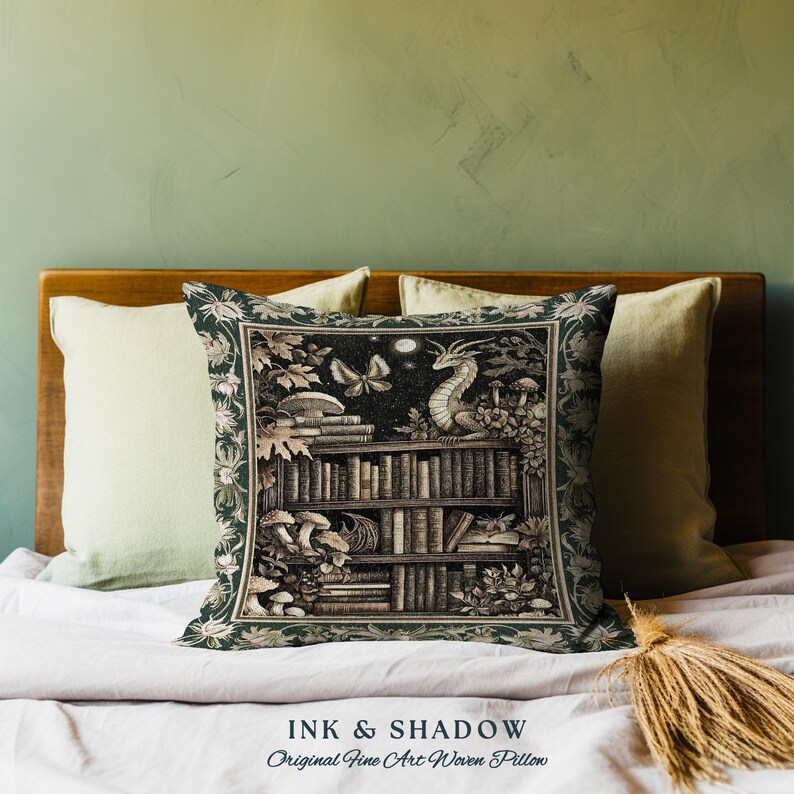 May include: A green and black woven pillow with a dragon, a bookshelf, and a butterfly. The pillow has the text "INK & SHADOW Original Fine Art Woven Pillow" printed on the bottom.